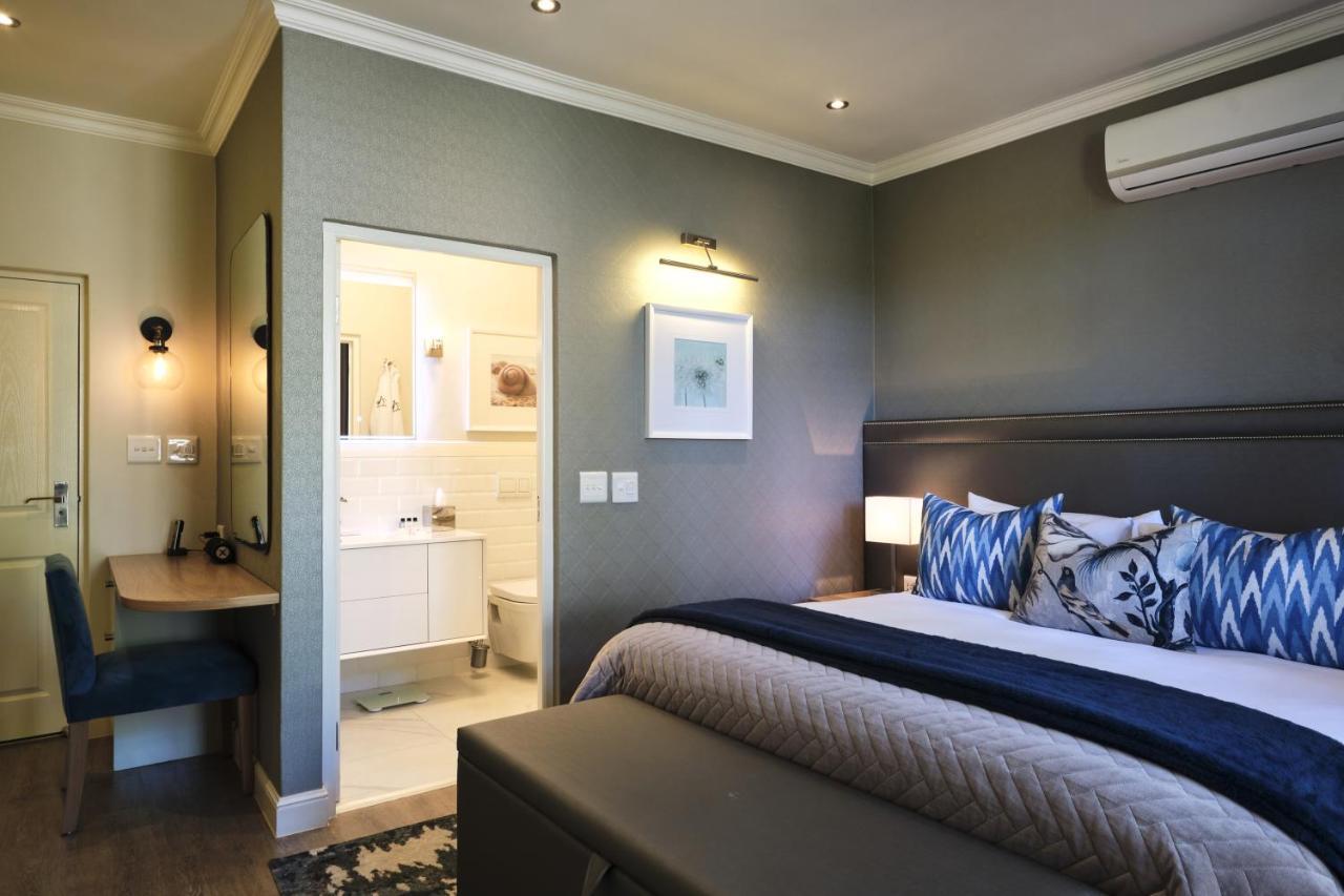 Alluvia Boutique Winery & Luxury Accommodation 斯泰伦博斯 外观 照片 A bedroom at the Oyster Box