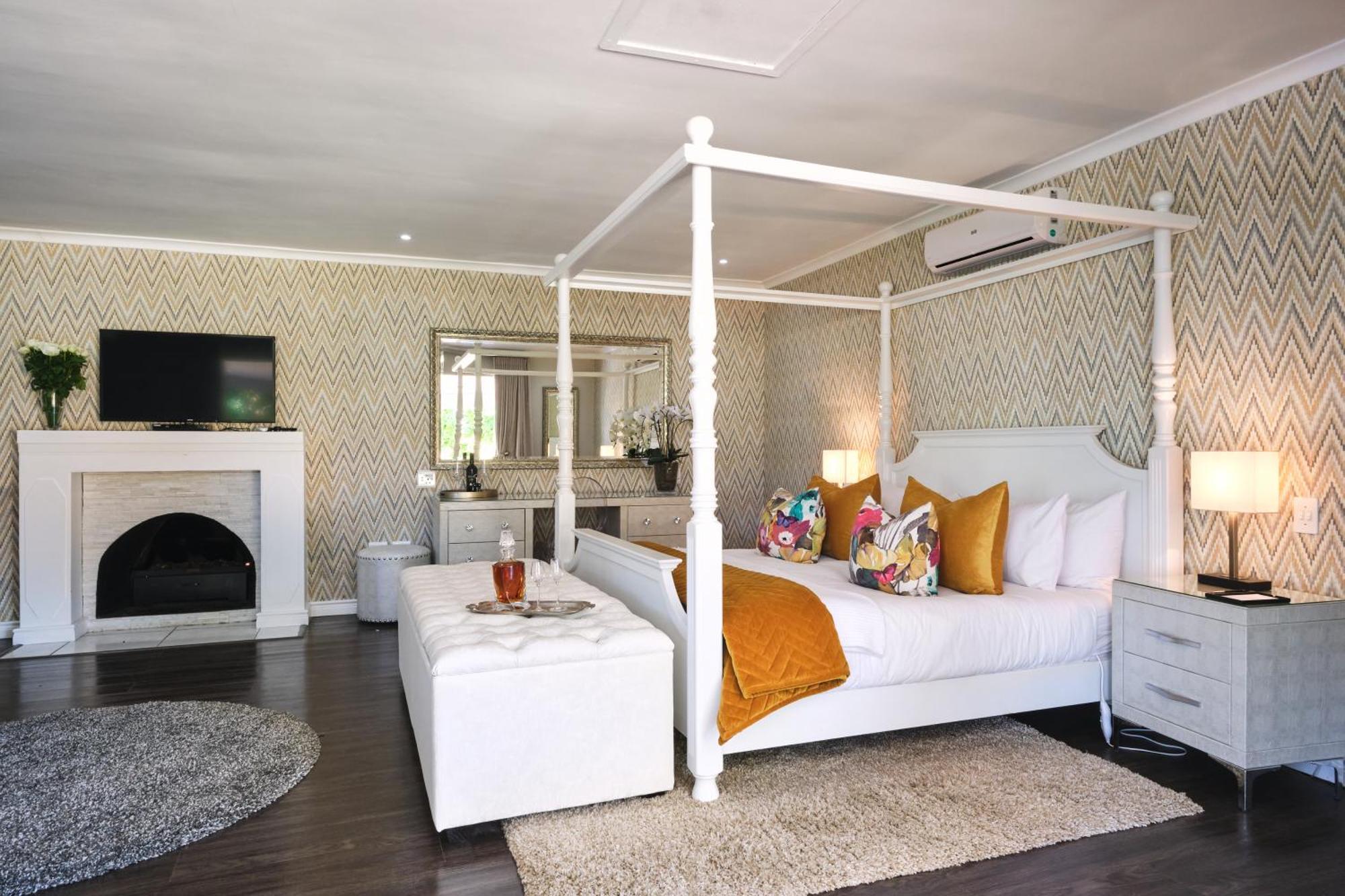 Alluvia Boutique Winery & Luxury Accommodation 斯泰伦博斯 客房 照片 A bedroom at the Cape Heritage